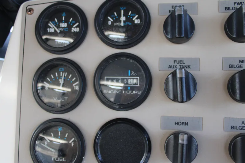  Yacht Photos Pics Control panel of 2002 Carver 356 Motor Yacht with gauges and switches.