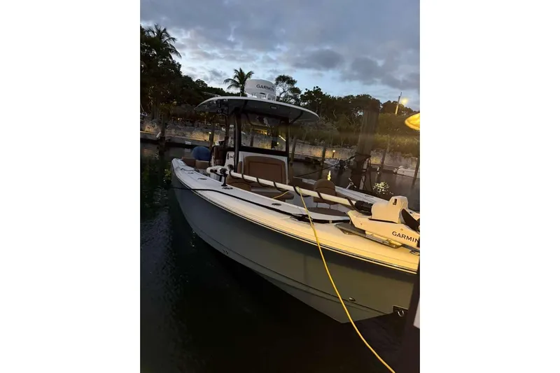  Yacht Photos Pics 2021 Sea Hunt Gamefish 30 boat docked at sunset with Garmin equipment.