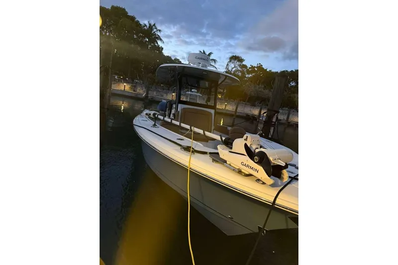  Yacht Photos Pics 2021 Sea Hunt Gamefish 30 boat docked at sunset with Garmin equipment.