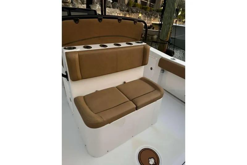  Yacht Photos Pics 2021 Sea Hunt Gamefish 30 boat with tan forward seating and cup holders.