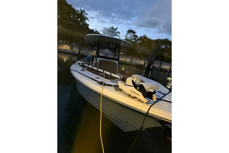  Yacht Photos Pics 2021 Sea Hunt Gamefish 30 boat docked at twilight with Garmin equipment.