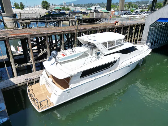 Safari Yacht Photos Pics 2001 Symbol 66 Pilothouse Yacht docked in a marina, viewed from above.