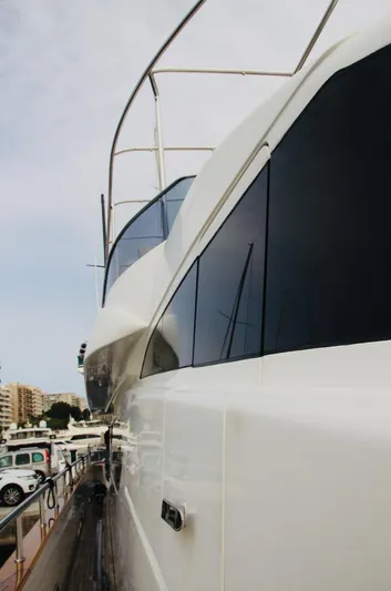  Yacht Photos Pics Monte Fino 82 yacht, 2005 model, docked with sleek design and tinted windows.