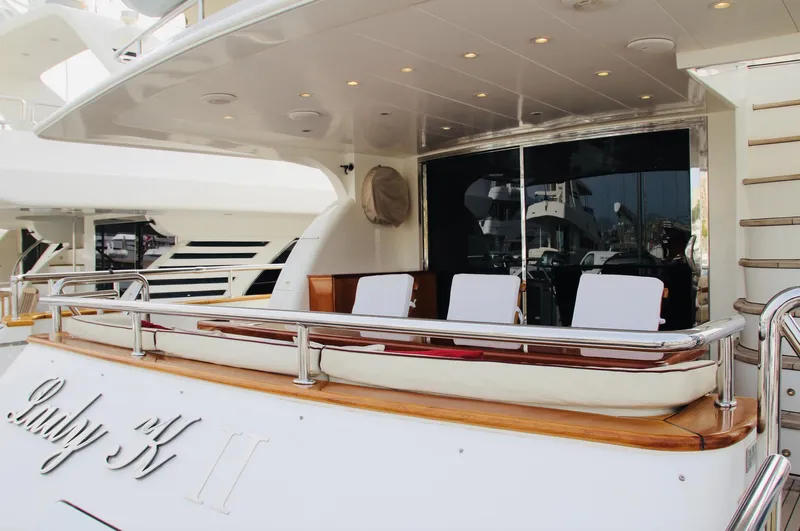  Yacht Photos Pics Luxury Monte Fino 82 yacht, 2005 model, featuring elegant deck seating and sleek design.