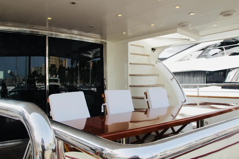  Yacht Photos Pics Luxury yacht Monte Fino 82, 2005 model, featuring elegant outdoor seating area.