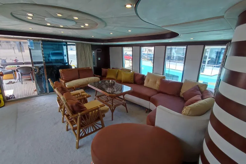  Yacht Photos Pics Luxurious interior of 2007 Custom 85 Motor Yacht with plush seating and elegant decor.