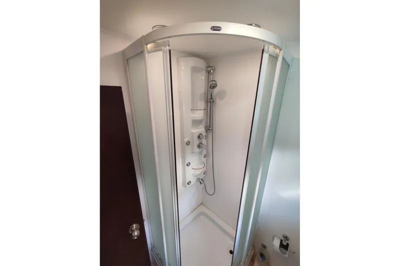  Yacht Photos Pics Shower cabin in 2007 Custom 85 Motor Yacht, featuring modern fixtures and glass doors.