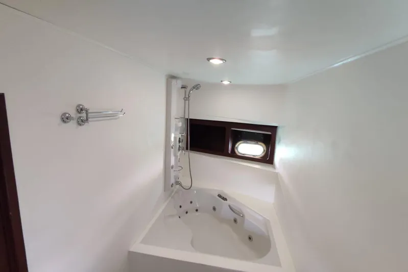  Yacht Photos Pics Luxurious bathroom with jacuzzi on 2007 Custom 85 Motor Yacht.