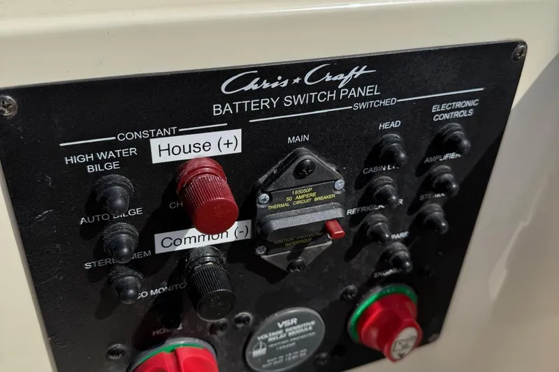  Yacht Photos Pics Chris-Craft Launch 28 battery switch panel, 2013 model, featuring various control switches.