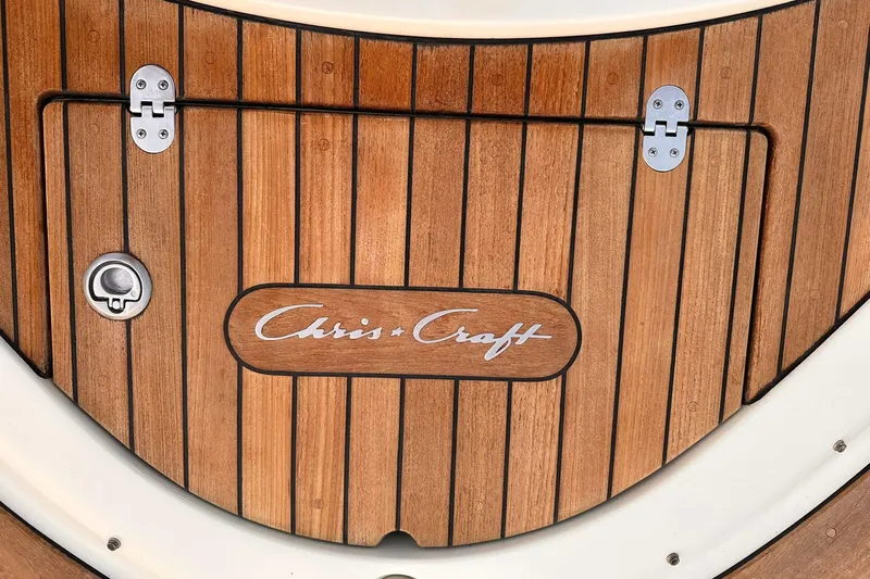  Yacht Photos Pics Teak deck of 2013 Chris-Craft Launch 28 boat with logo and metal fittings.