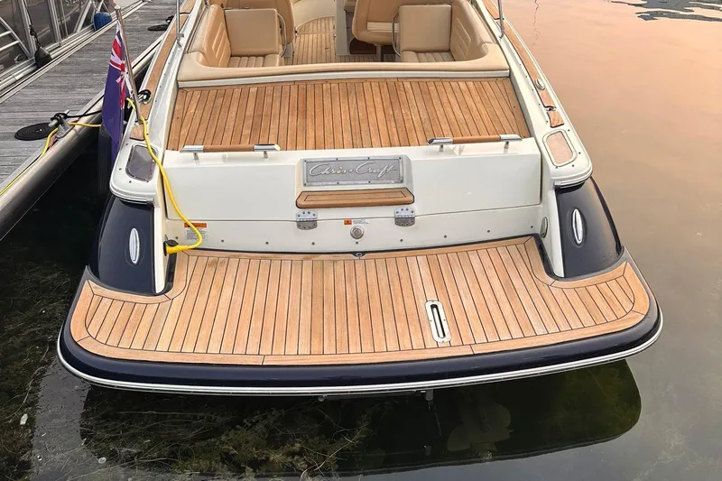  Yacht Photos Pics 2013 Chris-Craft Launch 28 boat with teak deck, docked at marina.