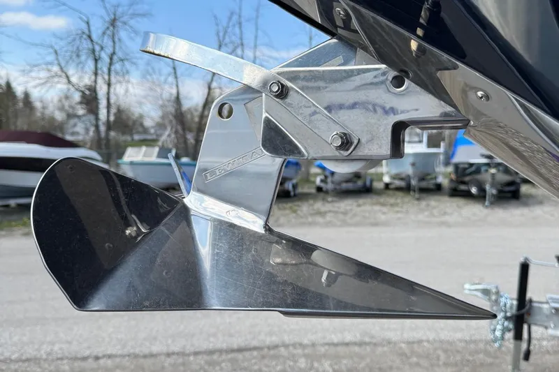  Yacht Photos Pics Close-up of a 2013 Chris-Craft Launch 28 boat anchor in a marina setting.