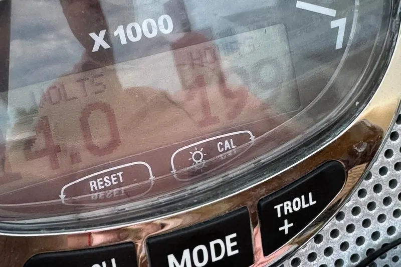  Yacht Photos Pics Close-up of a 2013 Chris-Craft Launch 28 boat dashboard displaying 14.0 volts and 159 hours.