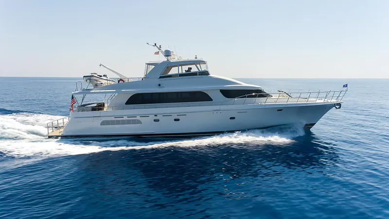 Lady Lorraine Yacht Photos Pics 2007 Cheoy Lee Bravo Flybridge Motor Yacht cruising on open water.