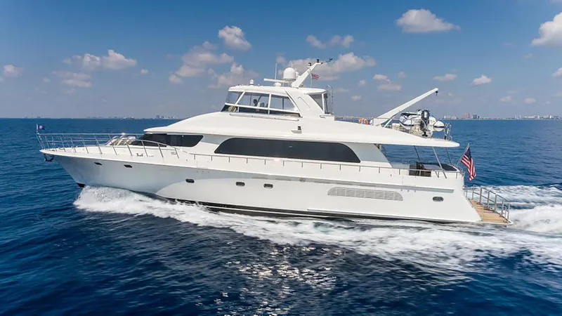 Lady Lorraine Yacht Photos Pics 2007 Cheoy Lee Bravo Flybridge Motor Yacht cruising on open water.