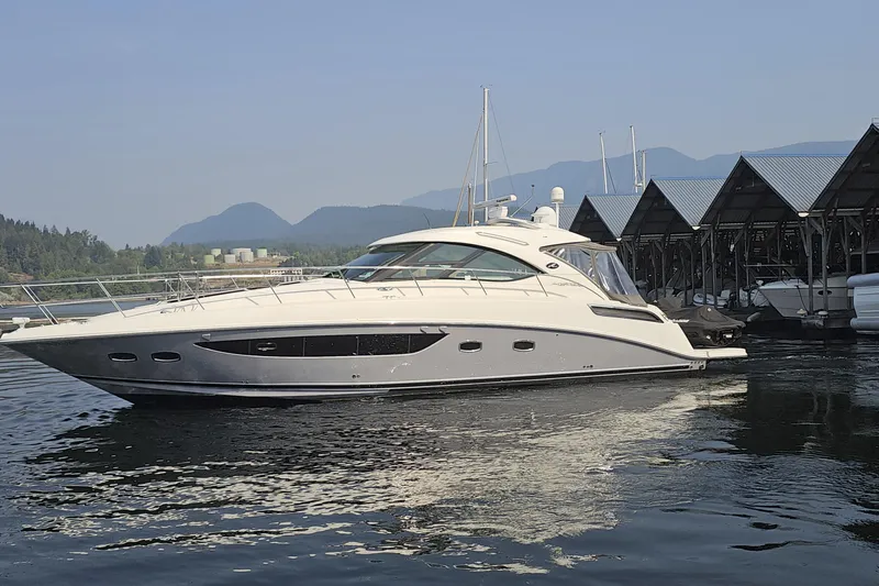 My Way Yacht Photos Pics 2013 Sea Ray 470 Sundancer yacht docked in a scenic marina setting.