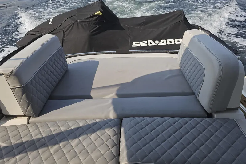 My Way Yacht Photos Pics 2013 Sea Ray 470 Sundancer boat with cushioned seating and Sea-Doo cover on water.