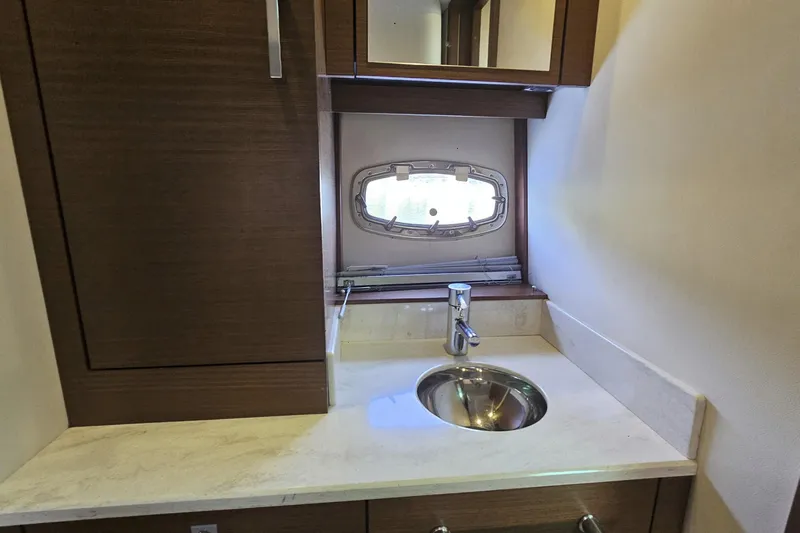 My Way Yacht Photos Pics Luxurious bathroom sink area on 2013 Sea Ray 470 Sundancer yacht.