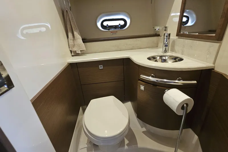 My Way Yacht Photos Pics Luxurious bathroom in 2013 Sea Ray 470 Sundancer yacht with modern fixtures and elegant design.
