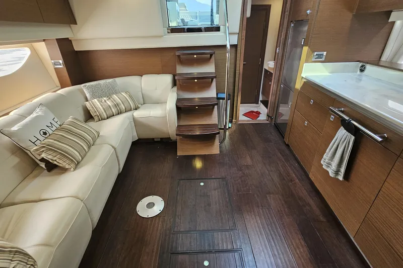 My Way Yacht Photos Pics Luxurious interior of 2013 Sea Ray 470 Sundancer yacht with elegant seating and modern amenities.