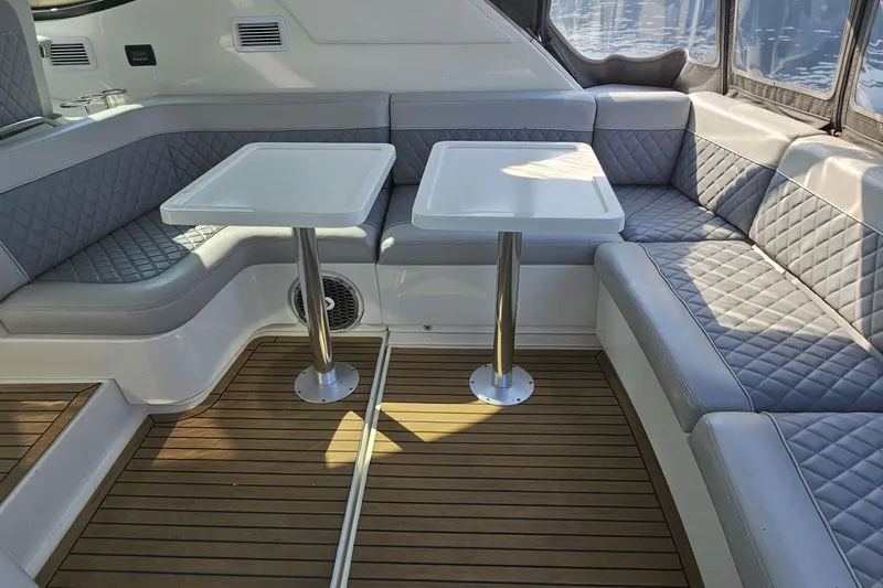 My Way Yacht Photos Pics Luxurious 2013 Sea Ray 470 Sundancer yacht interior with elegant seating and tables.