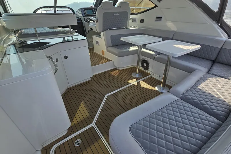 My Way Yacht Photos Pics Luxurious interior of 2013 Sea Ray 470 Sundancer yacht with elegant seating and modern design.
