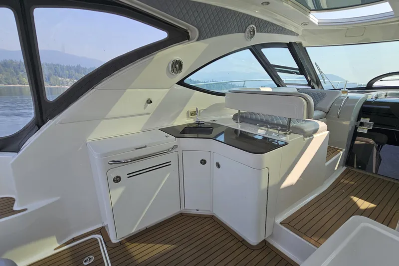 My Way Yacht Photos Pics Luxurious interior of 2013 Sea Ray 470 Sundancer yacht with sleek design and modern amenities.