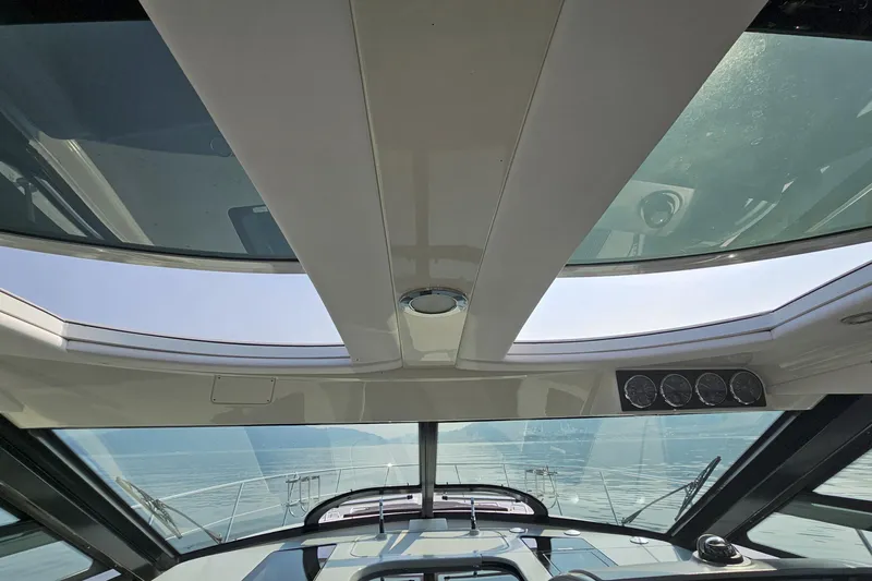 My Way Yacht Photos Pics Interior view of 2013 Sea Ray 470 Sundancer yacht with panoramic windows.