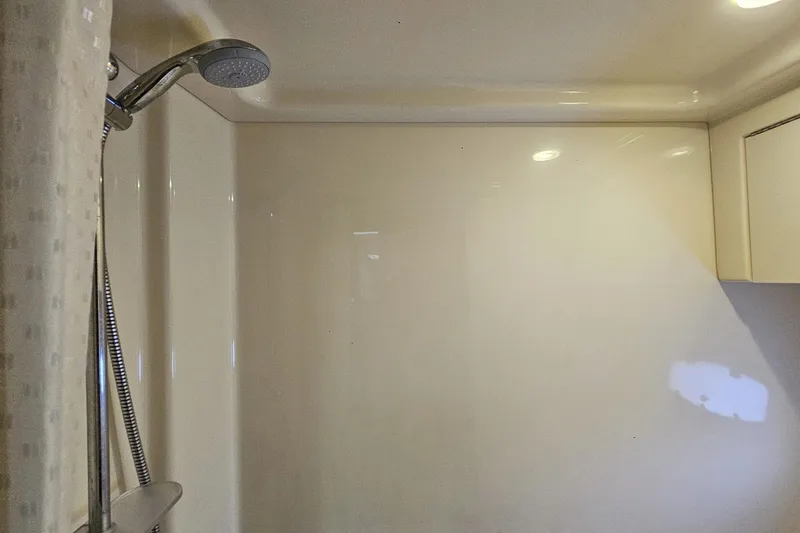 My Way Yacht Photos Pics Shower area in 2013 Sea Ray 470 Sundancer yacht, featuring modern fixtures.