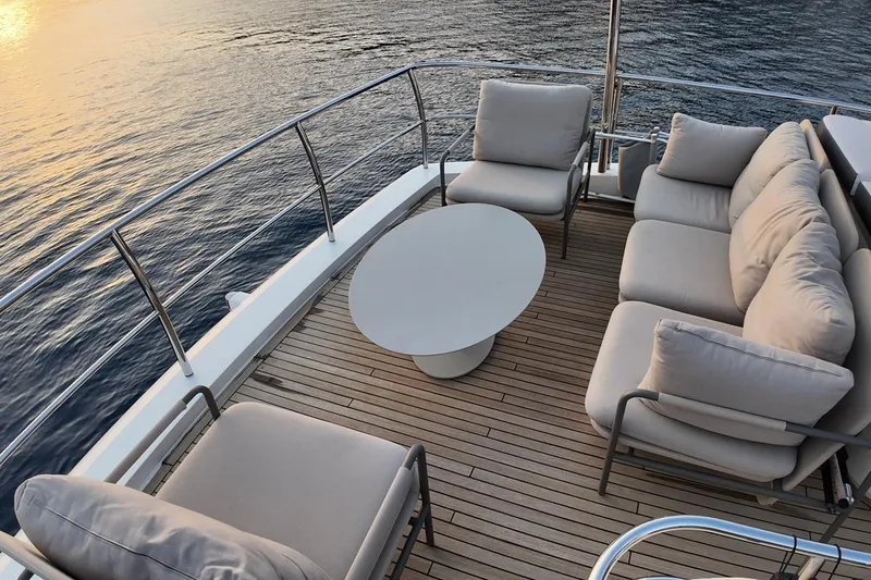 On Yacht Photos Pics Luxurious 2014 Princess 82 yacht deck with elegant seating and ocean view.