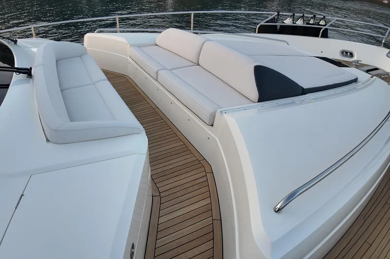 On Yacht Photos Pics Luxurious 2014 Princess 82 yacht deck with elegant seating and teak flooring.