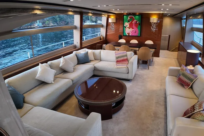 On Yacht Photos Pics Luxurious interior of 2014 Princess 82 yacht with elegant seating and vibrant artwork.