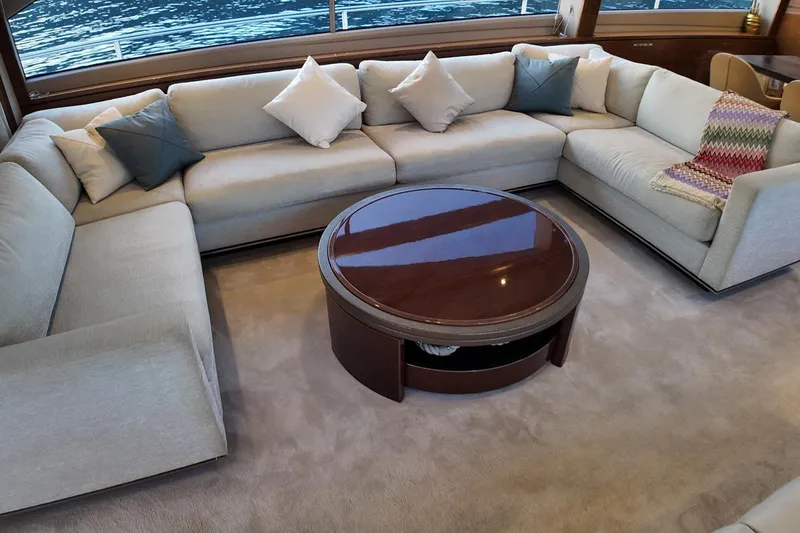 On Yacht Photos Pics Luxurious interior of 2014 Princess 82 yacht with elegant seating and round table.