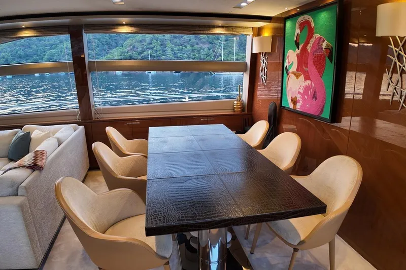 On Yacht Photos Pics Luxurious 2014 Princess 82 yacht interior with elegant dining area and scenic water view.