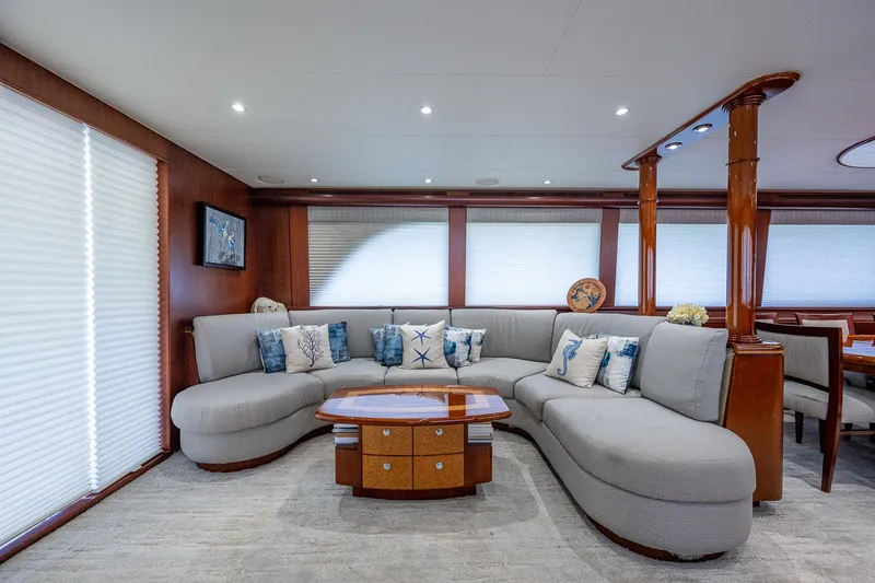 Lady Lorraine Yacht Photos Pics Luxurious interior of a 2007 Cheoy Lee Bravo Flybridge Motor Yacht with plush seating and elegant decor.