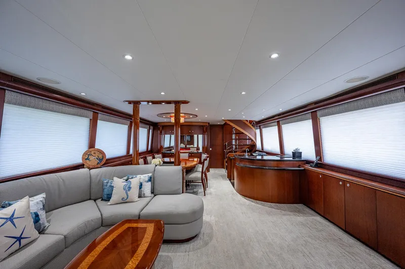 Lady Lorraine Yacht Photos Pics Luxurious interior of a 2007 Cheoy Lee Bravo Flybridge Motor Yacht with elegant wood finishes.