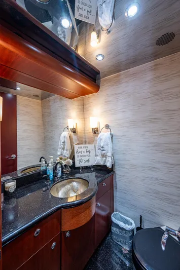 Lady Lorraine Yacht Photos Pics Luxurious bathroom in 2007 Cheoy Lee Bravo Flybridge Motor Yacht with modern fixtures.