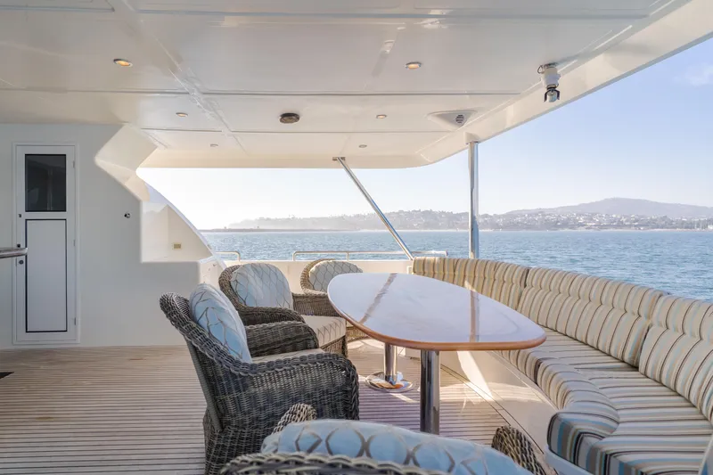 Harley G Yacht Photos Pics Luxurious 2014 TransWorld 116' yacht deck with elegant seating and ocean view.