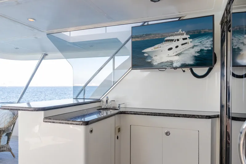 Harley G Yacht Photos Pics Luxury yacht interior with TV, featuring TransWorld 116' model, 2014, ocean view.