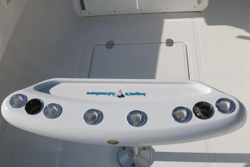 Logan's Adventure Yacht Photos Pics 2008 Venture 39 Center Console fishing rod holders on deck.