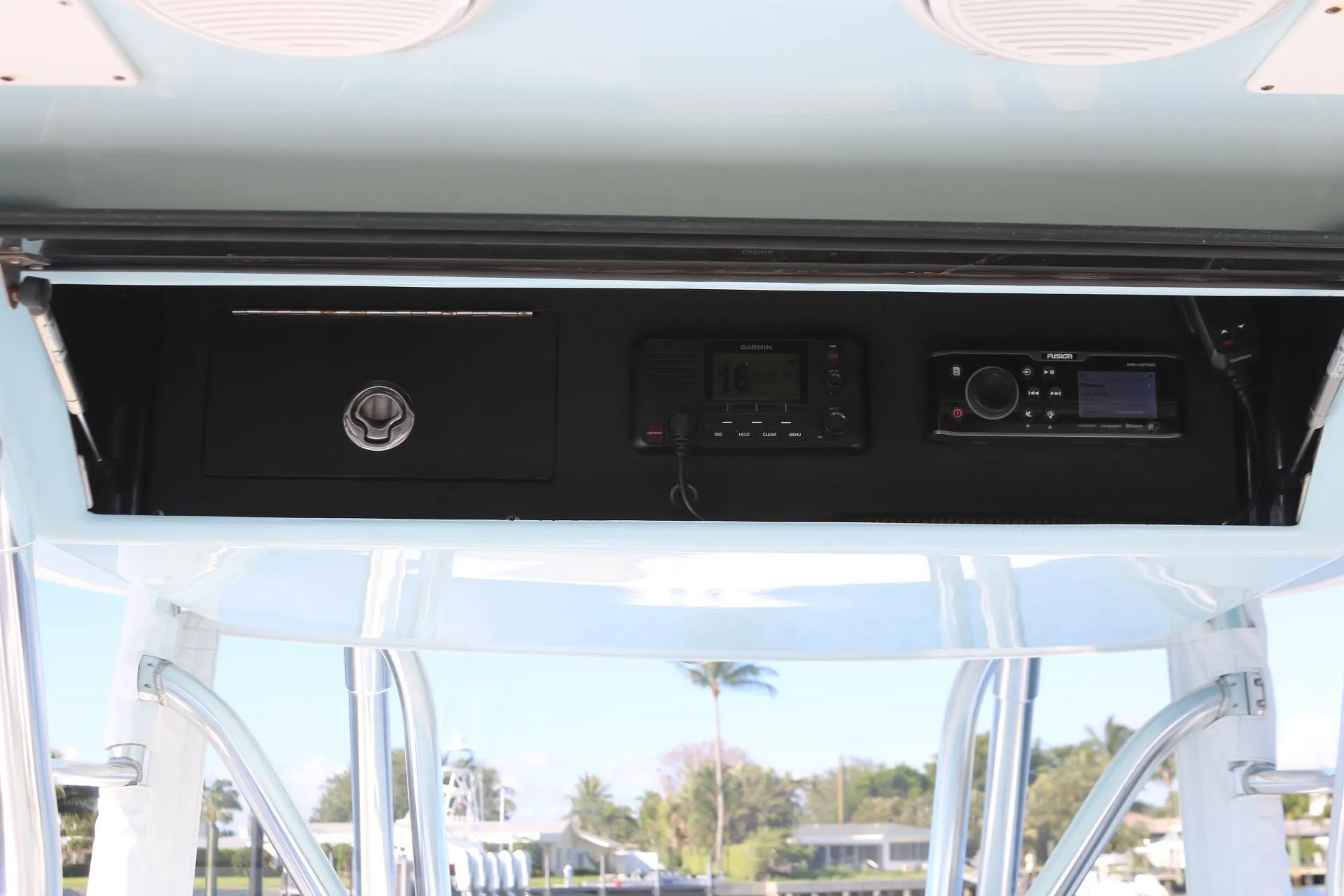 2008 Venture 39 Center Console boat electronics and storage compartment.