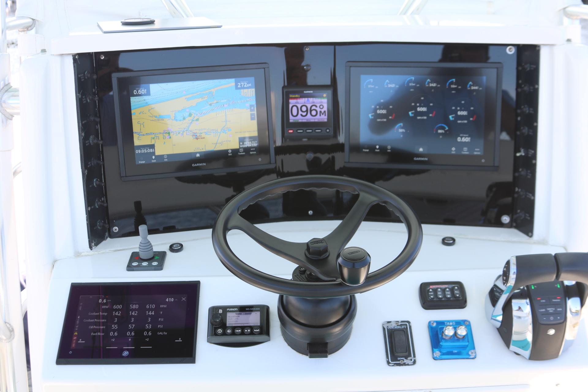 2008 Venture 39 Center Console boat dashboard with navigation and control systems.