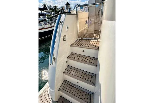 South Paws Yacht Photos Pics Outer Reef 62 SOUTH PAWS - Exterior Transom Stairs