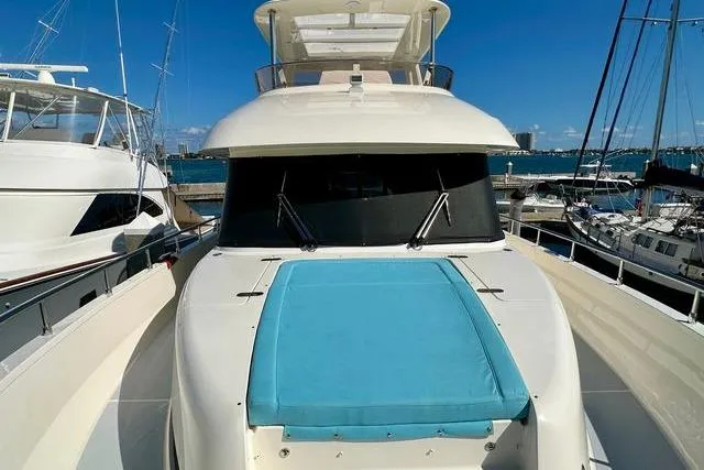 South Paws Yacht Photos Pics Outer Reef 62 SOUTH PAWS - Exterior Bow Sun Pads