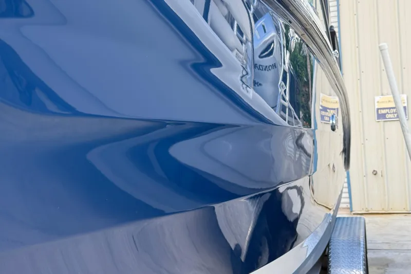  Yacht Photos Pics 2025 Sea Ray SDX 270 Outboard boat with sleek blue hull design.