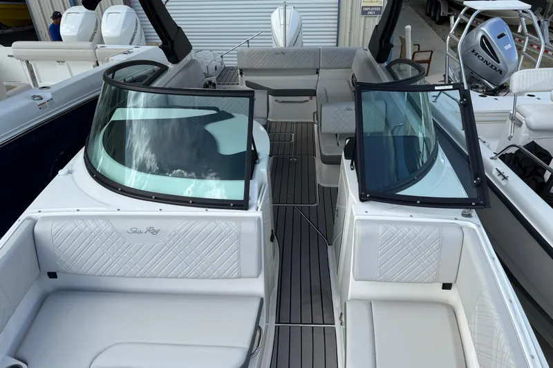  Yacht Photos Pics 2025 Sea Ray SDX 270 Outboard boat interior with sleek seating and modern design.