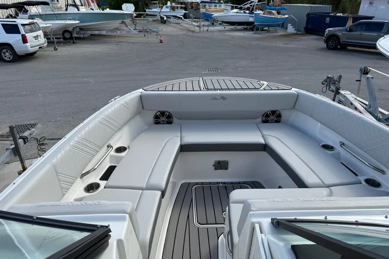  Yacht Photos Pics 2025 Sea Ray SDX 270 Outboard boat interior with spacious seating and cup holders.