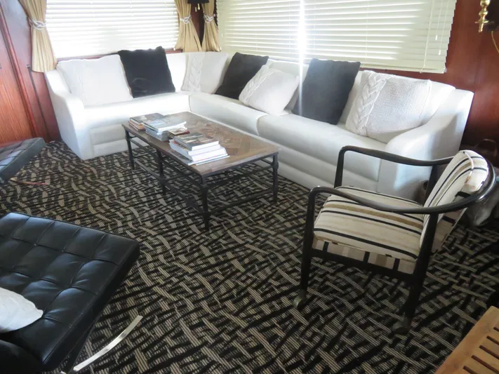 Rive' Gauche Yacht Photos Pics Luxurious interior of 1986 Hatteras 58 Motor Yacht with elegant seating and decor.