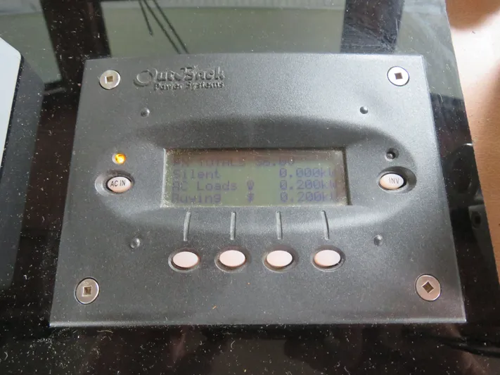 Rive' Gauche Yacht Photos Pics OutBack Power Systems display on 1986 Hatteras 58 Motor Yacht.