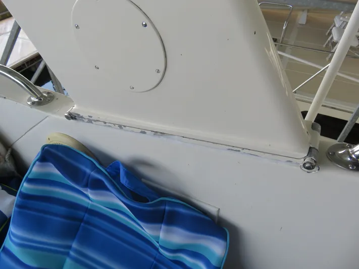 Rive' Gauche Yacht Photos Pics 1986 Hatteras 58 Motor Yacht deck detail with blue striped fabric.